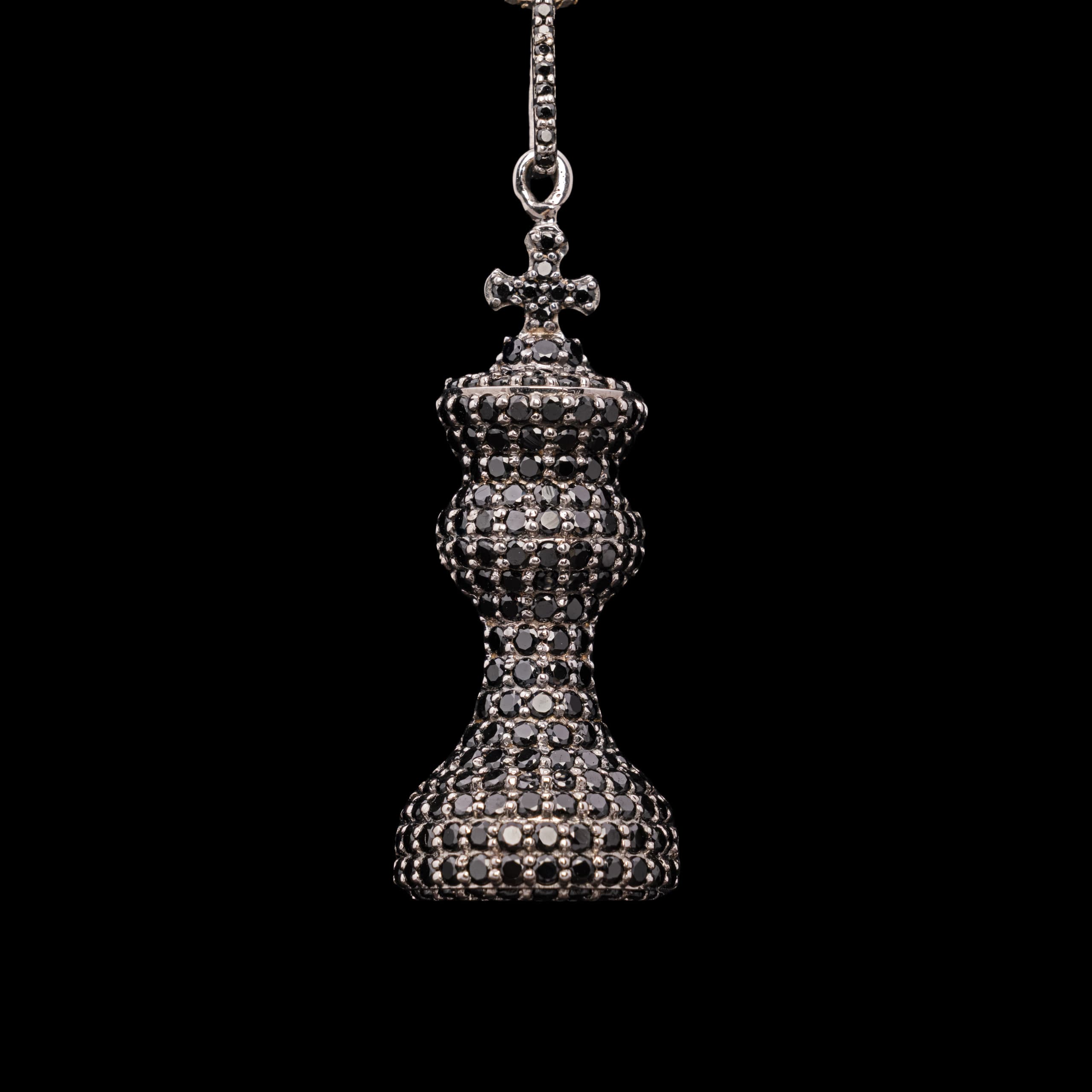 Long black-diamond drop pendant in an hourglass form